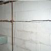Severe foundation damage from a long crack in a bucking wall of a Greely home.