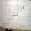 A diagonal stair step crack along the foundation wall of a Prescott home