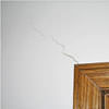 wall cracks along a doorway in a Greely home.