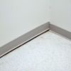 A partition wall separating from the floor in a Winchester home.
