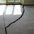 a huge crack in a concrete slab floor in Orleans