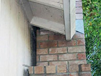A chimney leaning away from the home on a Manotick foundation
