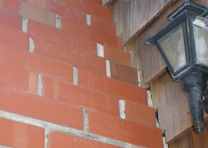 a repaired chimney in Manotick that had shown serious foundation damage and was repaired with a helical pier system.