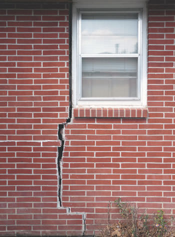 severe foundation wall cracks along a window in Cumberland