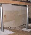 A system of crawl space support posts adding structural support to a crawl space in Embrun