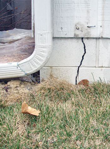 foundation wall cracks due to street creep in Russell