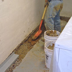 Digging a trench for a French Drain system in Ottawa