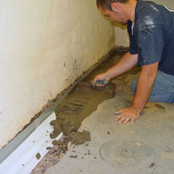 Testing a French drain system in a Perth home.