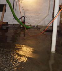 Several feet of floodwaters in a Oxford Mills basement