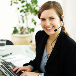 A disaster restoration customer service expert in Gloucester manning the phones
