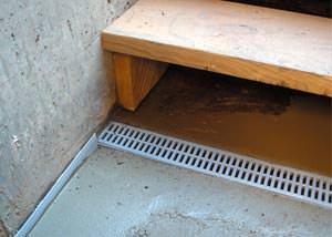 a hatchway entrance in Winchester that has been protected from flooding by our TrenchDrain basement drainage system.
