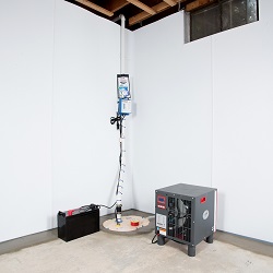 Sump pump system, dehumidifier, and basement wall panels installed during a sump pump installation in Greely